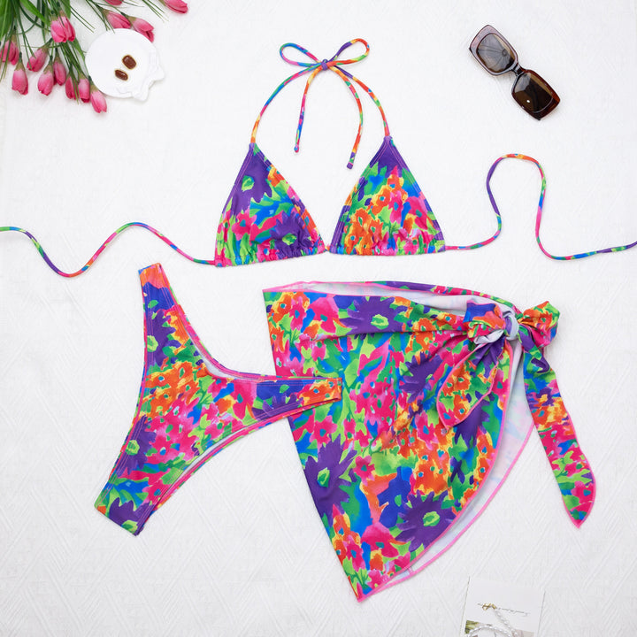 Dame bikini-sæt med farverig blomsterprint og afslappet indpakket nederdel Stilla