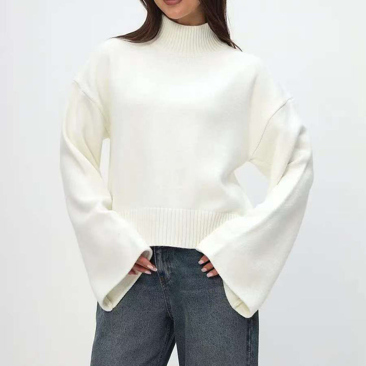 Kvindernes chunky strikket sweater med stående krave og voluminøse ærmer Stilla