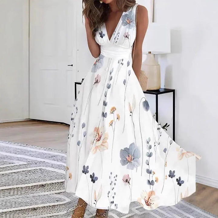Dame maxikjole med florale motiver og elegant V-udskæring Stilla