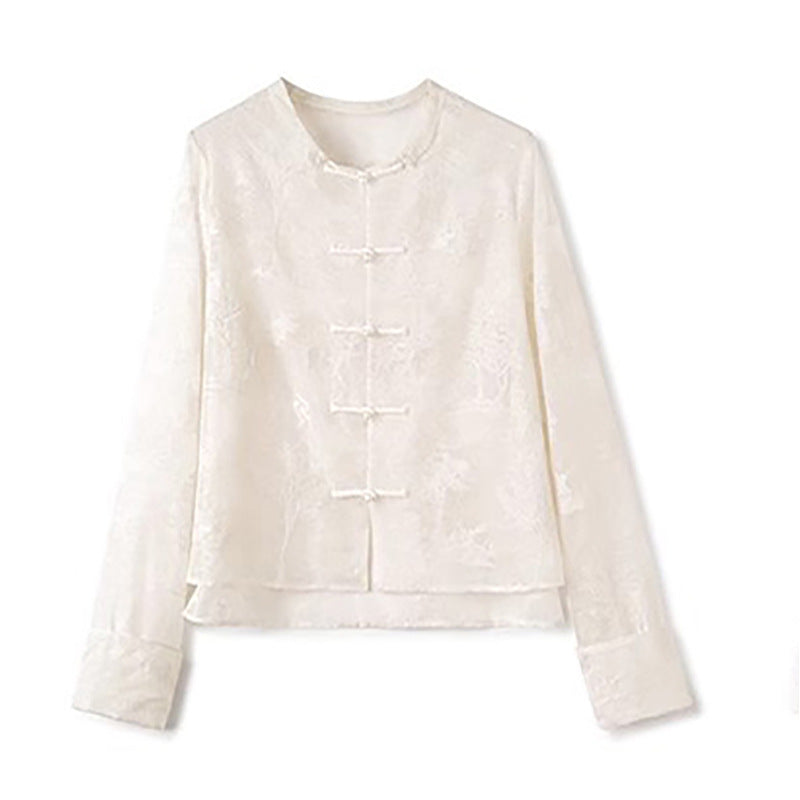 Damebluse med fin broderi og elegante knapdetaljer Stilla