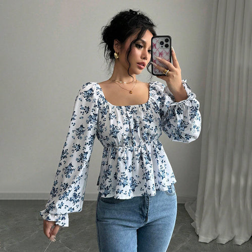 Kvinders bluse med blomsterdesign og voluminøse ærmer Stilla