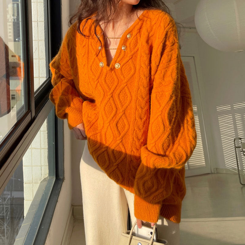 Dame chunky strik sweater med knapdetaljer og kabelmønster Stilla