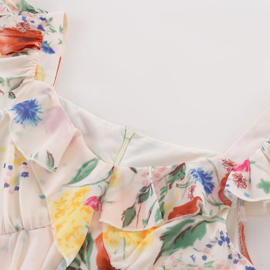 Dame Maxikjole med muntert blomsterprint og feminine flæsedetaljer Stilla