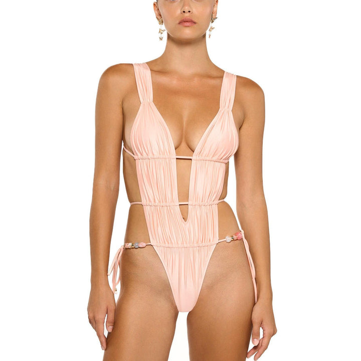 Dame badedragt med innovativt cut-out-design og dekorative detaljer Stilla