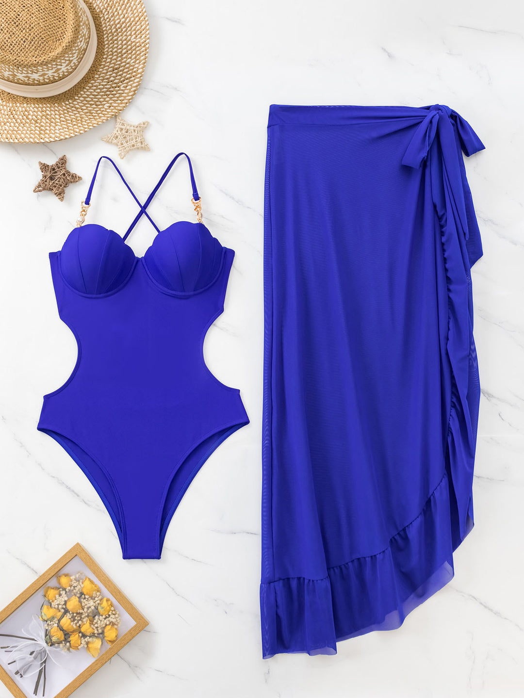 Dame en-piece badedragt med sexy cut-out-design og elegante detaljer Stilla