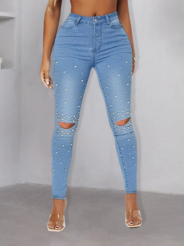 Dame Skinny Jeans med dekorative perleudsmykninger og moderne revnedetaljer Stilla