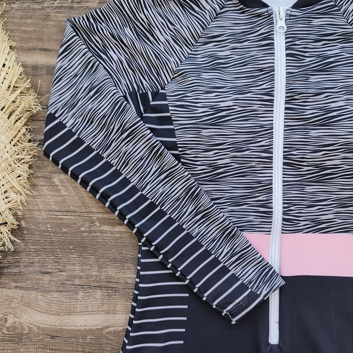 Dame Sporty Énstykket Badedragt med moderne lynlås og elegant mønstring Stilla