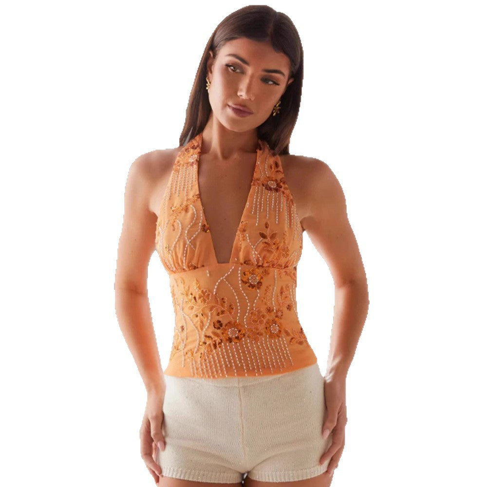 Kvindernes halterneck-toppe med blomstret design og glitrende applikationer