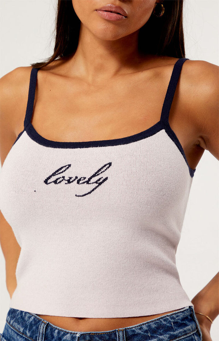 Dame Crop-Top med fint maskestrik og legende skrift Stilla