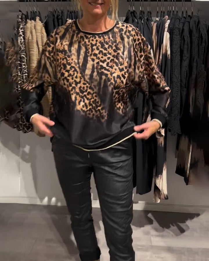 Dame nan silke Oversize-bluse med dyremønster, raglanærmer og elastisk kant Skovae