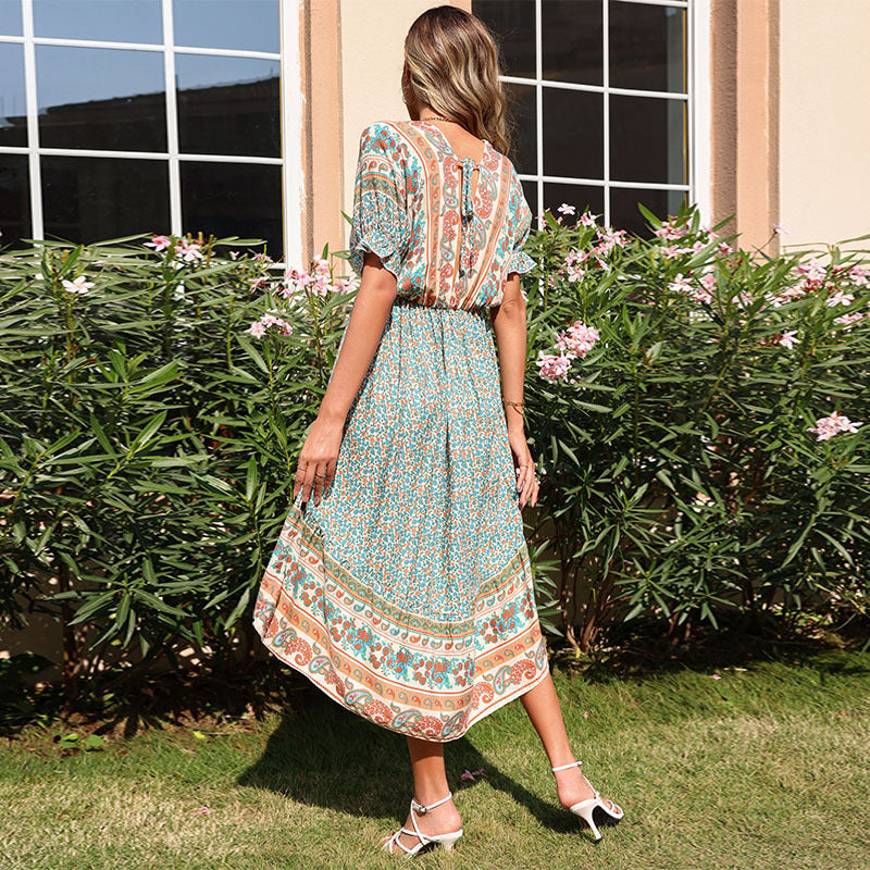 Femme High-Low Bohemian Midi-kjole med iøjnefaldende tryk Stilla