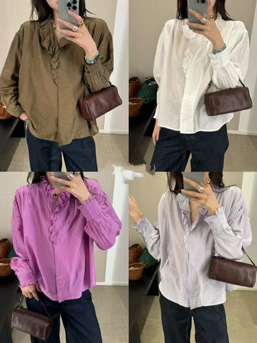 Damebluse med elegante flæsedetaljer og højhalset krave Stilla
