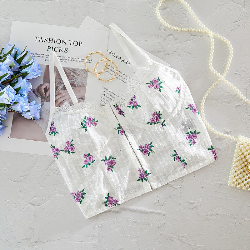 Dame spids-bustier med floral design og dekorativ lynlås Stilla