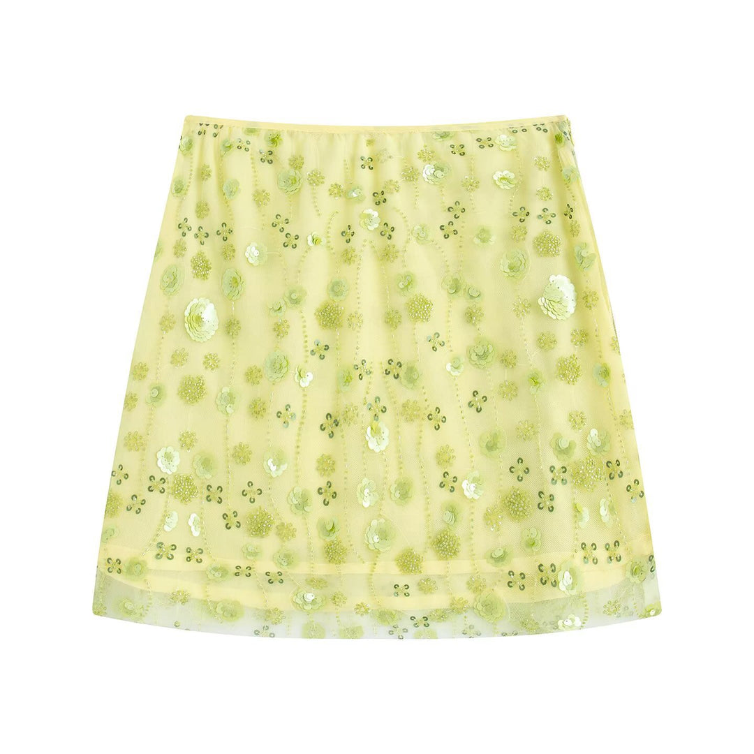 Dame mini skirt med glitrende palietter og blomstret design Skovae
