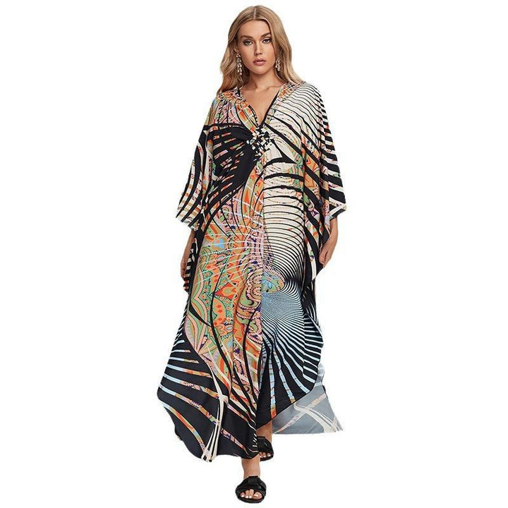 Dame Strandkaftan med blomsterdesign og luftig snit Stilla