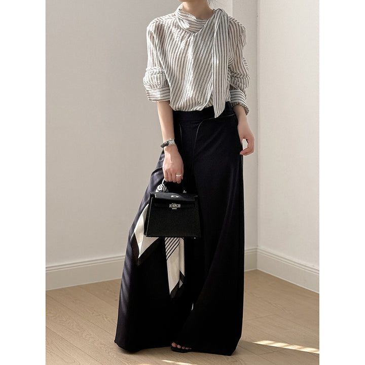 Dame stribet bluse med innovativt indpakningsdesign og moderigtige detaljer Stilla