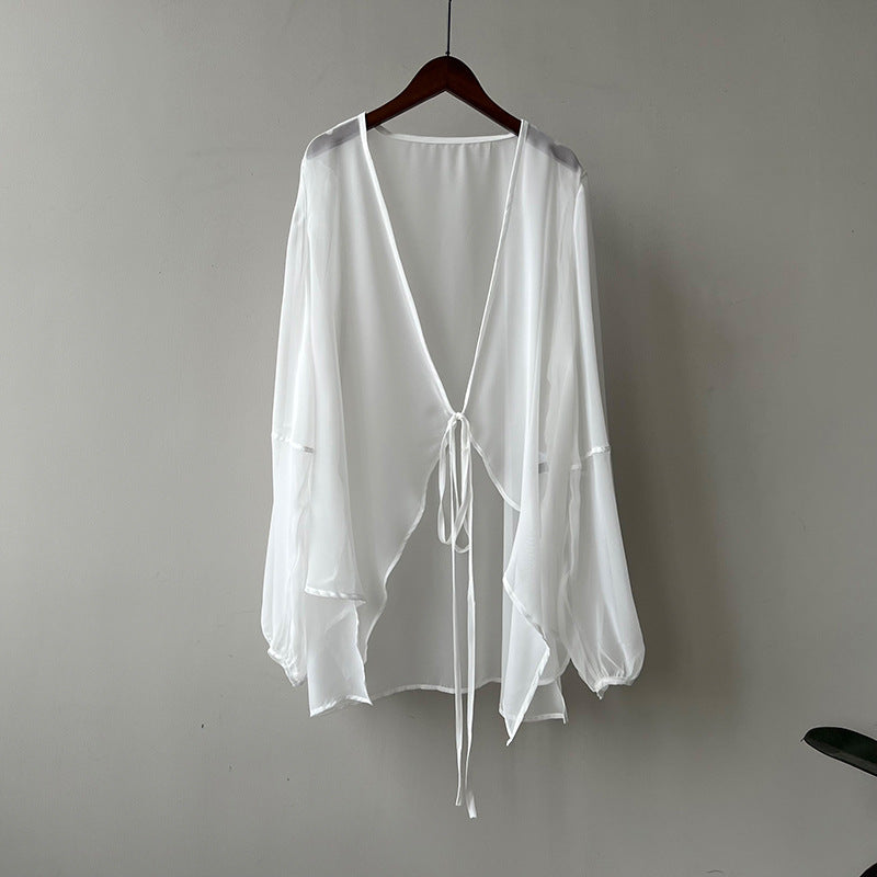 Dame elegant gennemsigtig bluse med dyb V-hals og bindebånd Stilla