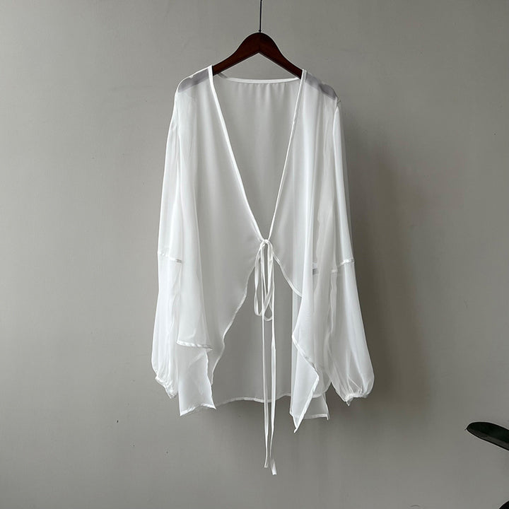 Dame elegant gennemsigtig bluse med dyb V-hals og bindebånd Stilla