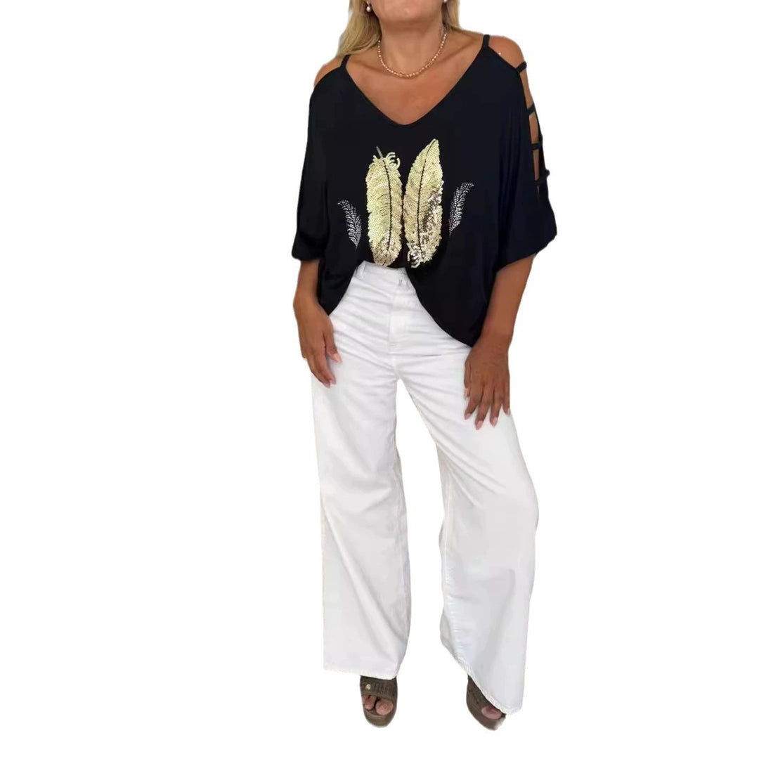 Dame Oversized T-shirt med kreative cut-outs og iøjnefaldende tryk Stilla