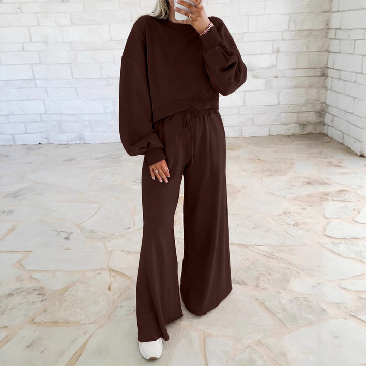 Kvinders komfortable sportssæt med afslappet cropped sweatshirt og bred bukseudsparing Stilla