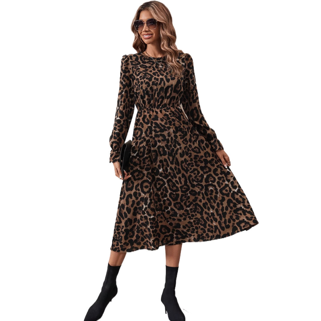 Kvinders elegante maxikjole med moderne leopardprint og nostalgiske puffærmer Stilla