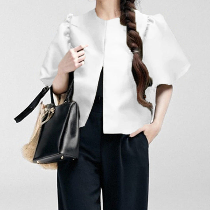 Damebluse med voluminøse puffærmer og moderne design Skovae