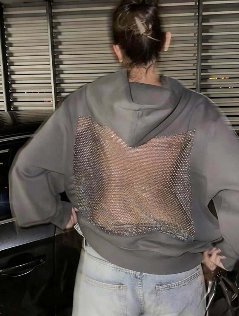 Dame med hættesweatshirt med transparent broderet rygparti Skovae