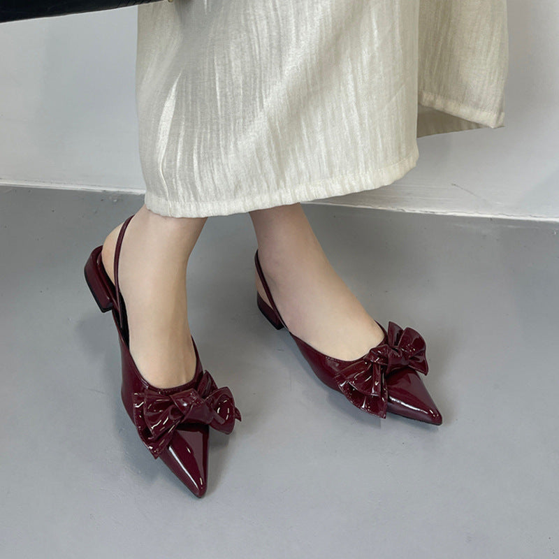 Dame Slingback-pumper med elegant bueudsmykning og spids tå Stilla