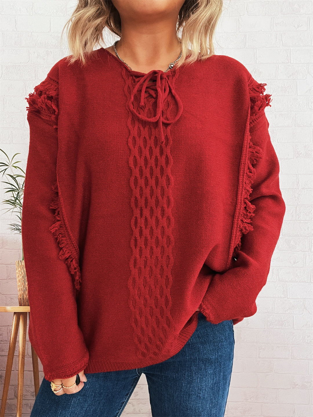 Kvinders chunky strikket sweater med afslappede frynser og dekorativ kabel-design Stilla