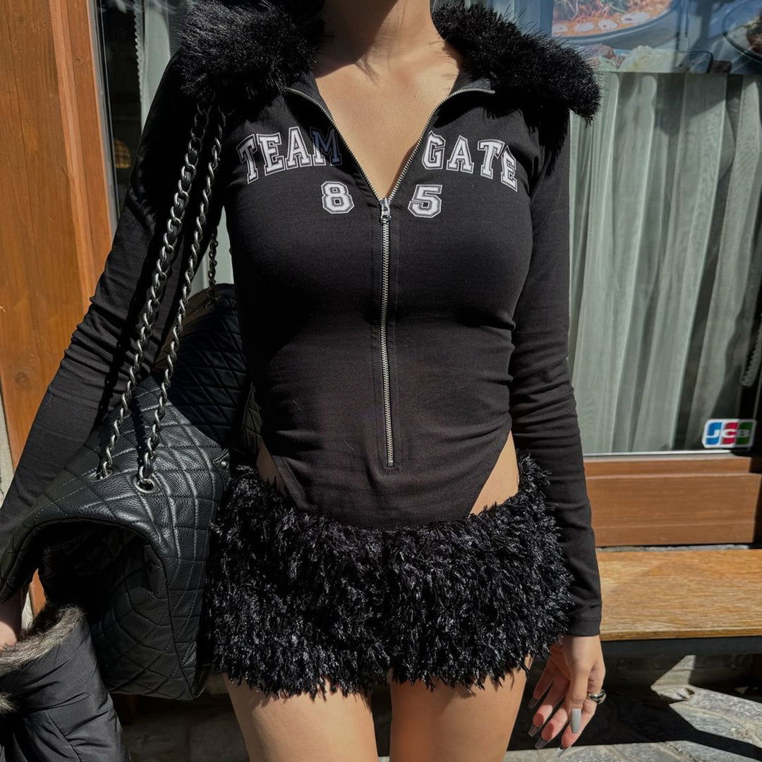 Dame Sporty One-Piece med en spændende zip-front og polstret detalje Stilla