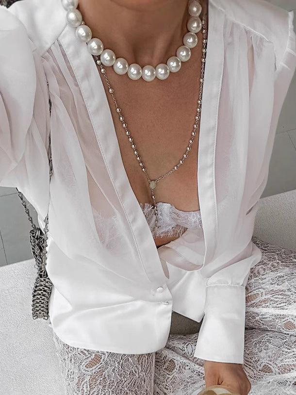 Dame elegant skjorte med transparente og strukturerede ærmer Stilla