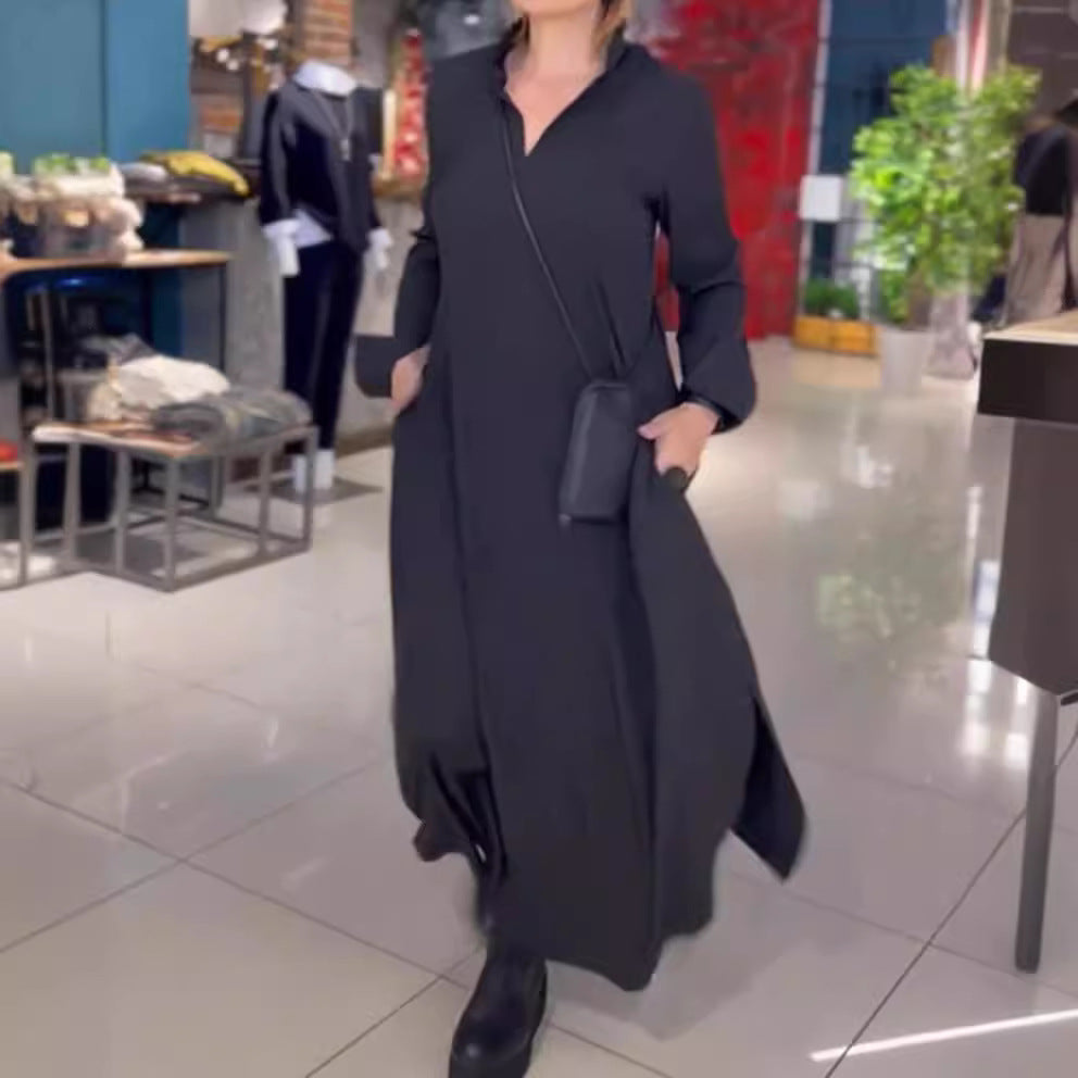 Kvinders maxikjole med elegant krave og praktisk lomme design Stilla