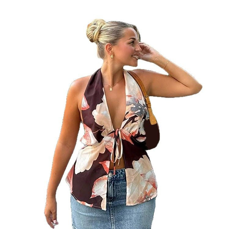 Damebluse med dyb V-hals og bindbart design Stilla