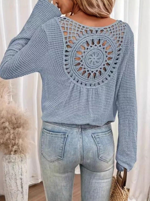 Dame afslappet strikbluse med unikt hækle-detail Stilla