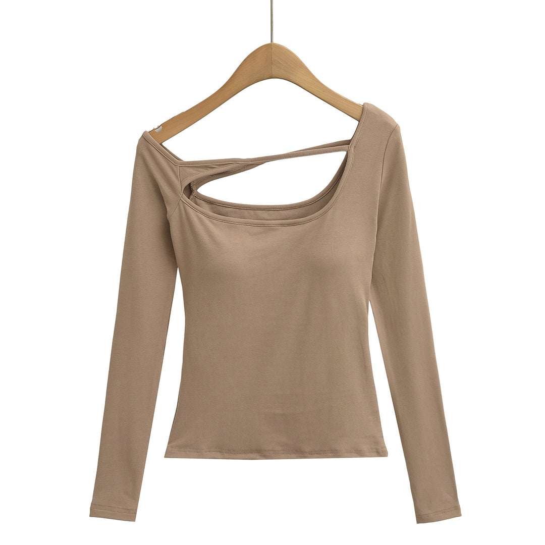 Dame langærmet top med innovativt cut-out-design og figursyet pasform Stilla