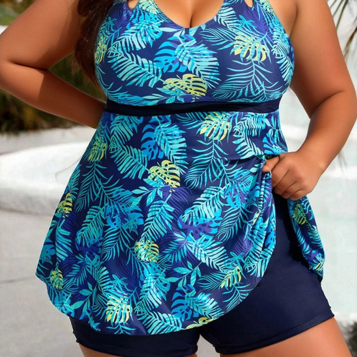 Dame sporttop med fashionable stropper og blomstret design Stilla