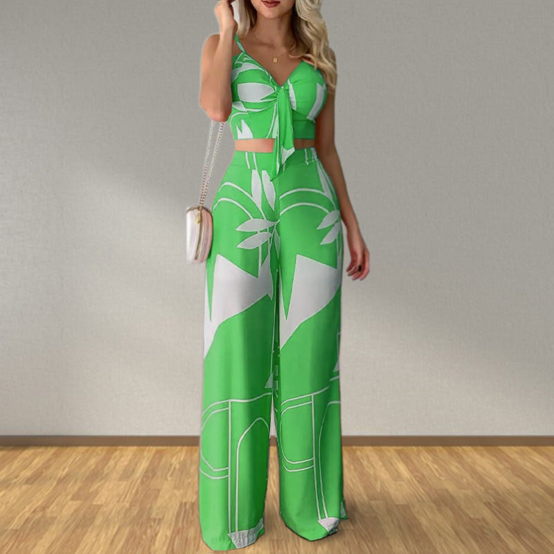 Kvinders elegante sæt med kombination af cropped top og brede bukser Stilla