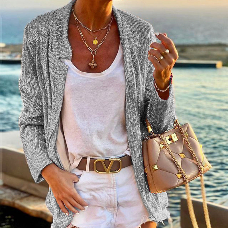 Kvinders cardigan med glitrende effekt og løs pasform