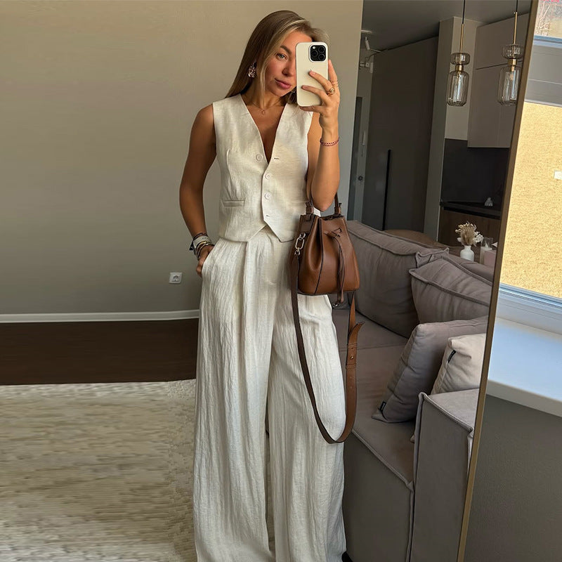 Dame to-delt sæt lavet af let linned med figursyet overdel og bredt bukseben Stilla