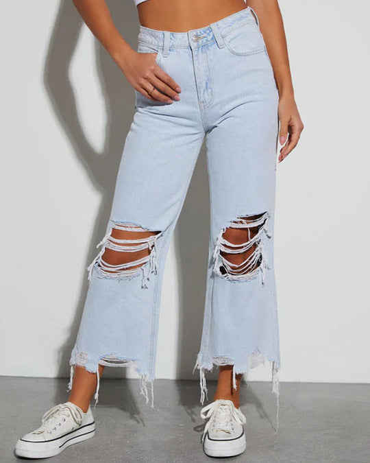 Dame Mom Jeans med frynset kant og ribbet detaljer Stilla
