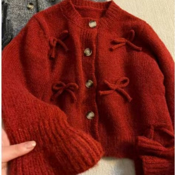 Kvinders cardigan med dekorative sløjfer på