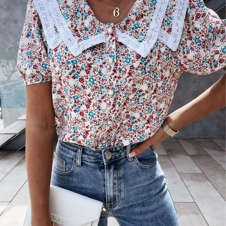 Damebluse med floraltryk og spidse detaljer Stilla