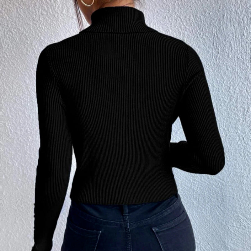Femme Ribstrik Rullekravepullover med udskåret ærme-detalje Stilla