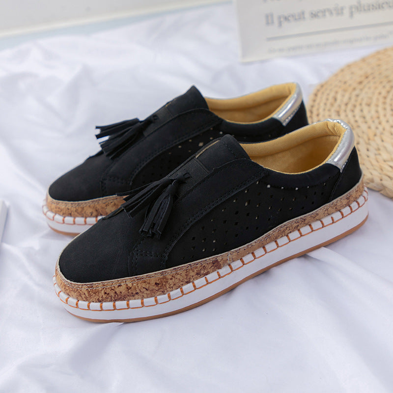 Dame nan perforeret Slip-On Sneaker med kvaster, kork-platform og dekorativ håndsyning Skovae