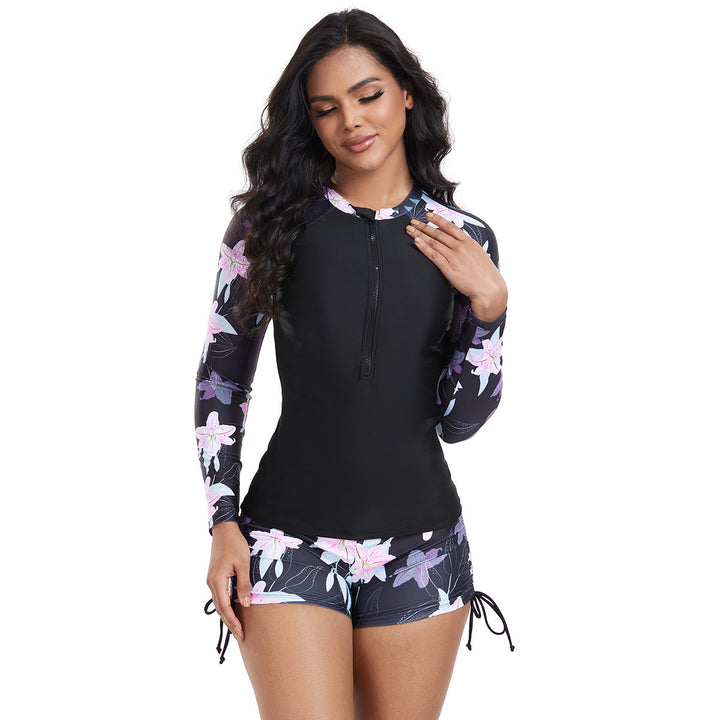 Dame Rashguard med blomstermønster og shorts Stilla