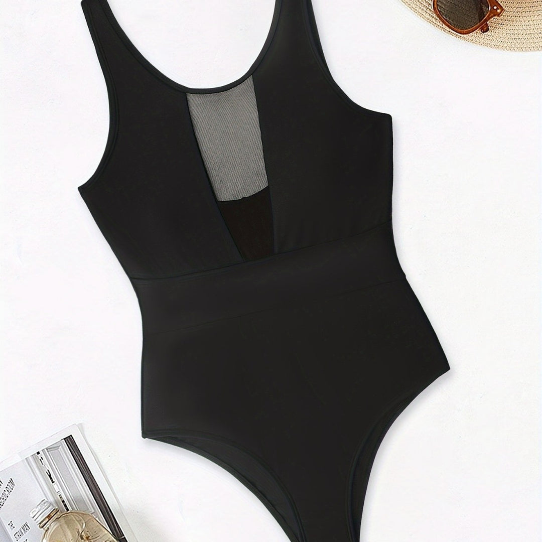 Dame Sporty One-Piece med dyb V-hals og transparente mesh-detaljer Skovae