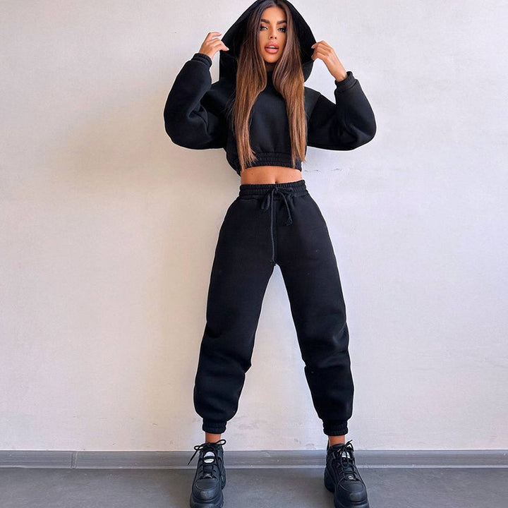 Kvinders sporty cropped sweat sæt med elastisk talje og praktiske lommer