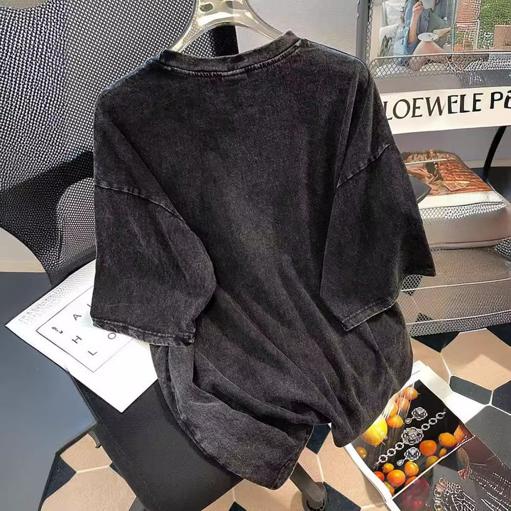 Dame T-shirt med kreativt hovedtelefondesign og afslappet oversized pasform Stilla