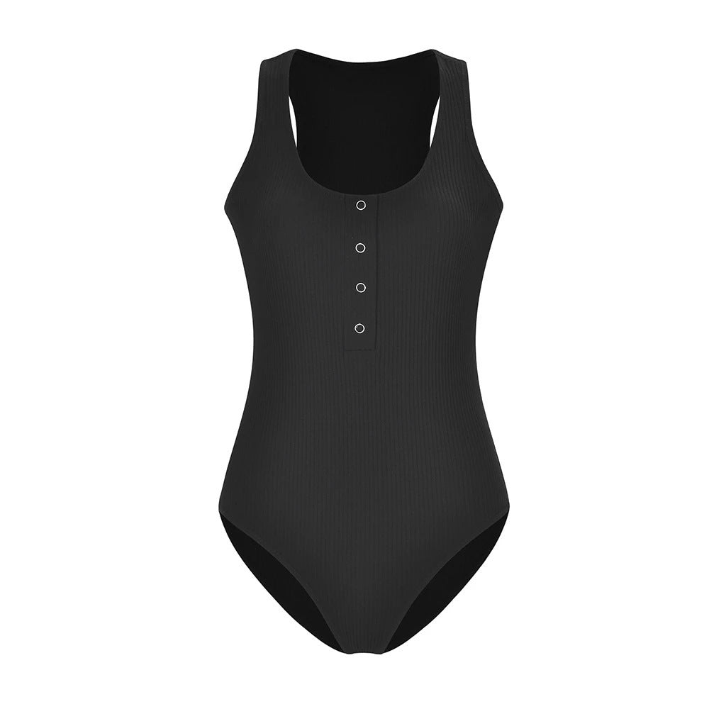 Dame højhalset bodysuit med knapdetalje og ribstruktur Stilla