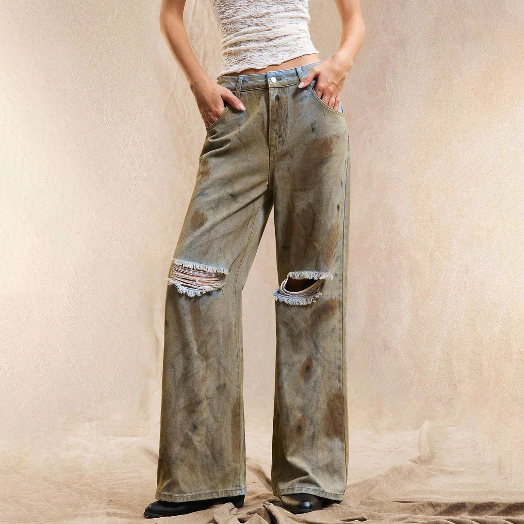 Kvindernes bredskårne jeans med slidte detaljer Stilla